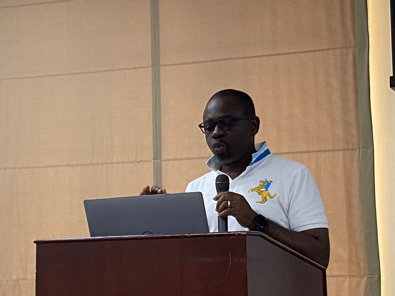 NG Nwankwo leading a session at a lectern