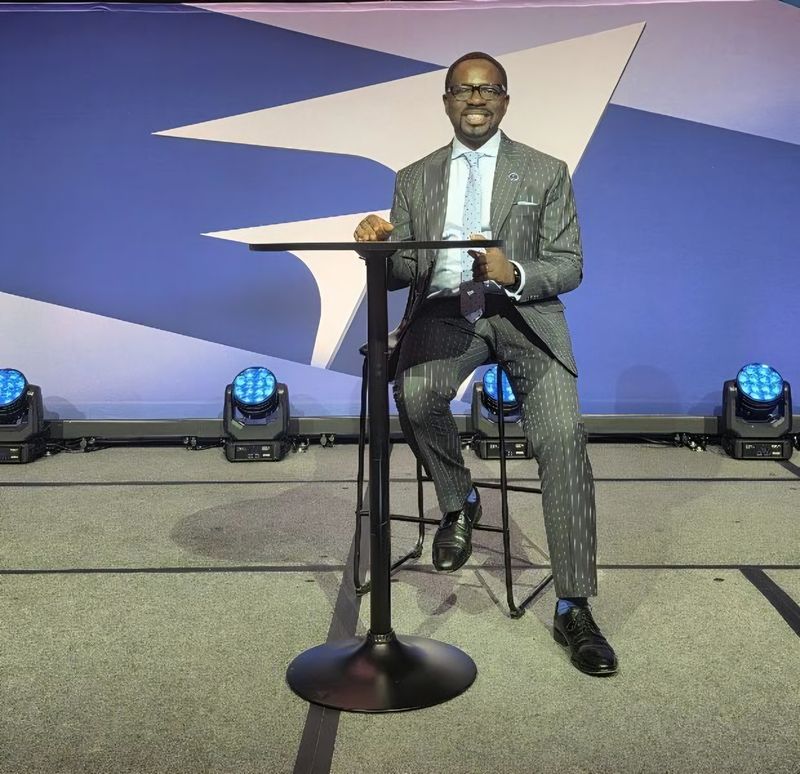 NG Nwankwo seated on stage at a leadership conference